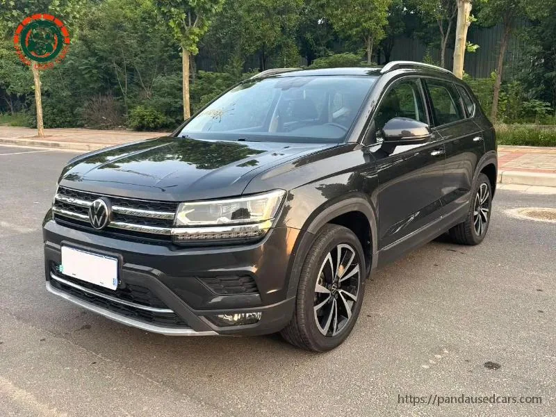 White Volkswagen Tiguan L front three-quarter view, representative China-market vehicle